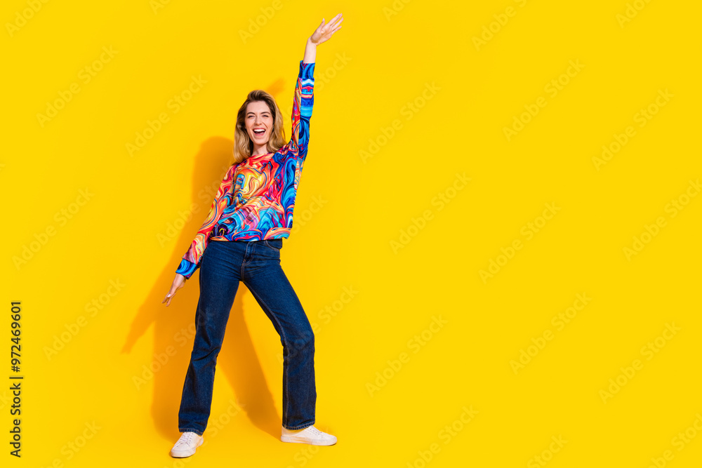 Obraz premium Photo of young funny blonde hair beautiful woman dancing at concert entertainment isolated on yellow color background