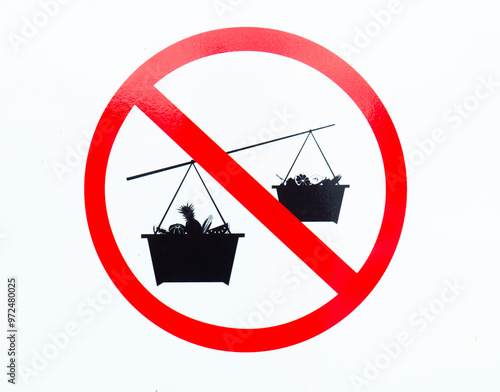 A red prohibition sign on a white background indicating no children allowed in the basket lift for safety reasons.