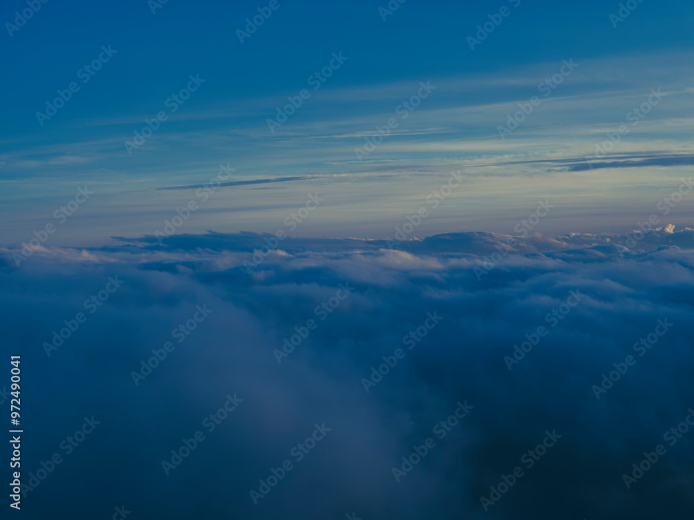 view on clouds from airplane window view on clouds from airplane window