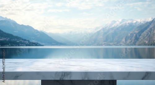 Serene lakeside view with a marble table in the foreground.