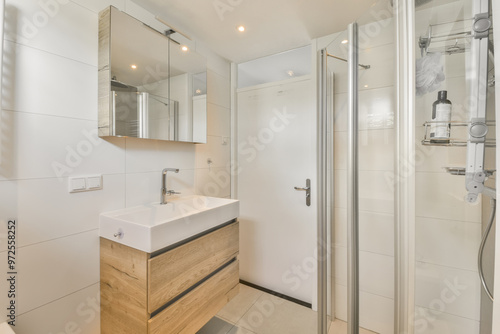 Modern and bright bathroom interior with shower
