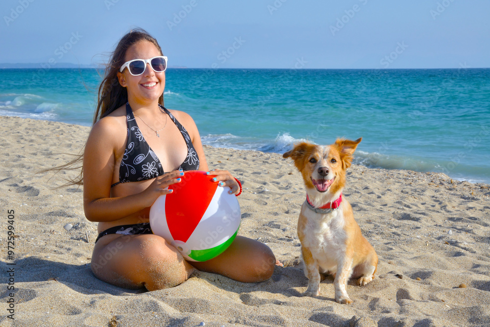 Toddler girl relaxing at beach
