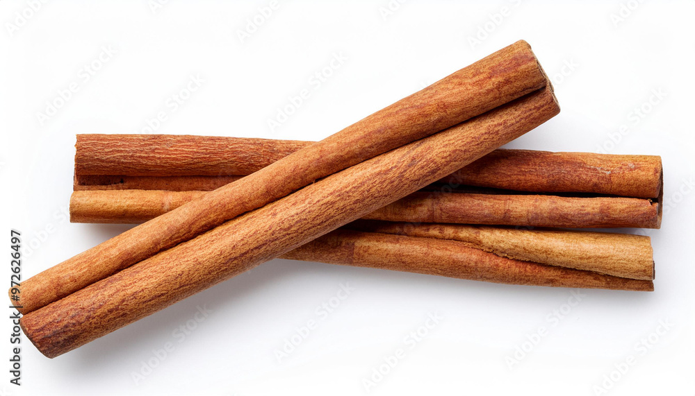 Cinnamon sticks isolated on white background. Top view Cinnamon sticks isolated on white background. Top view