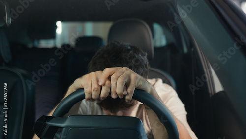 Obraz na płótnie Frustrated stressed worried irritated angry Caucasian driver worry about traffic