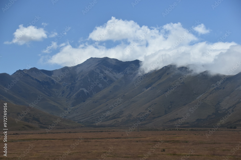 The stunning scenery and landscapes around the blue Lake Tekapo on the South Island of New Zealand The stunning scenery and landscapes around the blue Lake Tekapo on the South Island of New Zealand