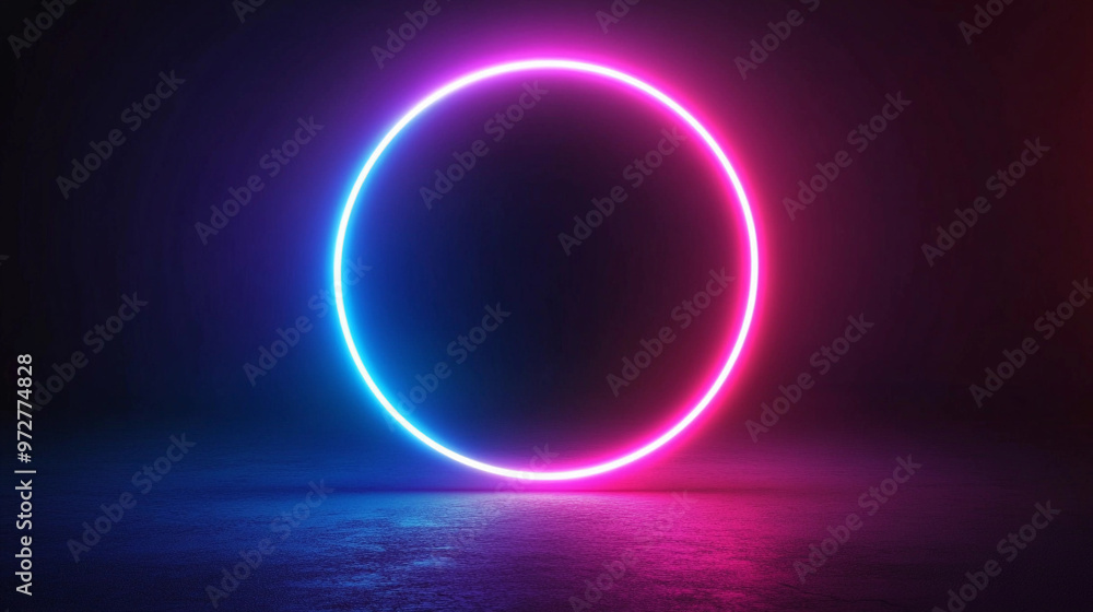 A bright glowing neon blue and pink circle of light on a dark background with reflection on the floor. A bright glowing neon blue and pink circle of light on a dark background with reflection on the floor.