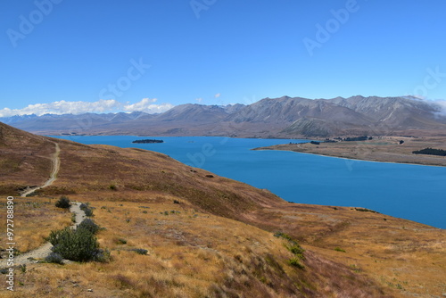 The stunning scenery and landscapes around the blue Lake Tekapo on the South Island of New Zealand