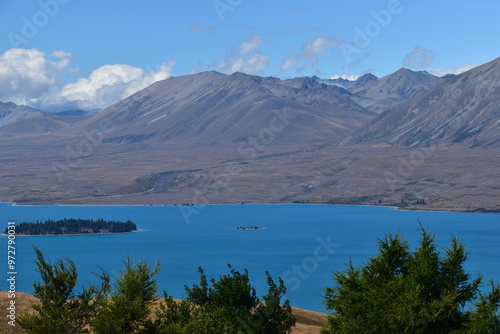 The stunning scenery and landscapes around the blue Lake Tekapo on the South Island of New Zealand photo