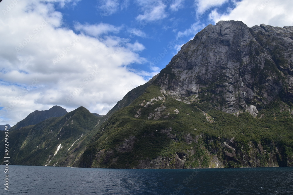 The fiords and stunning mountain landscape at Milford Sound on the South Island of New Zealand The fiords and stunning mountain landscape at Milford Sound on the South Island of New Zealand