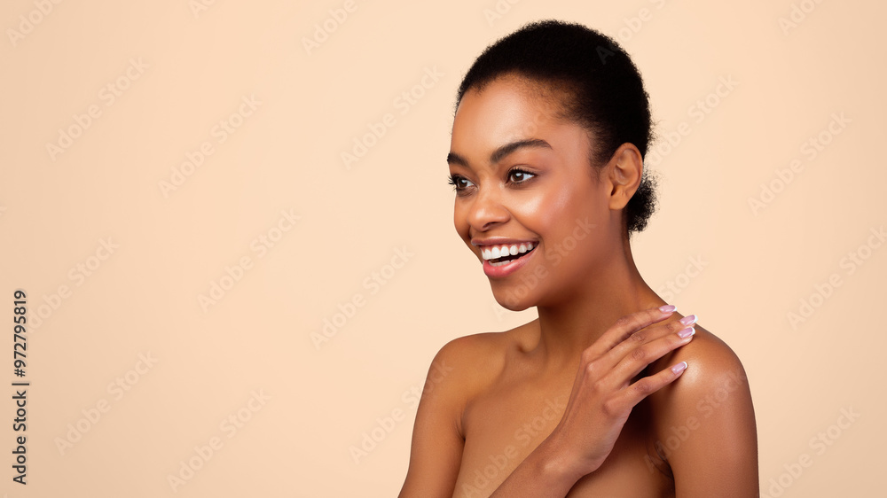 Body Care Concept. Joyful African American Lady Posing Shirtless Looking Aside At Blank Space Standing On Gray Studio Background. Natural Female Beauty, Pampering And Skincare. Panorama Body Care Concept. Joyful African American Lady Posing Shirtless Looking Aside At Blank Space Standing On Gray Studio Background. Natural Female Beauty, Pampering And Skincare. Panorama