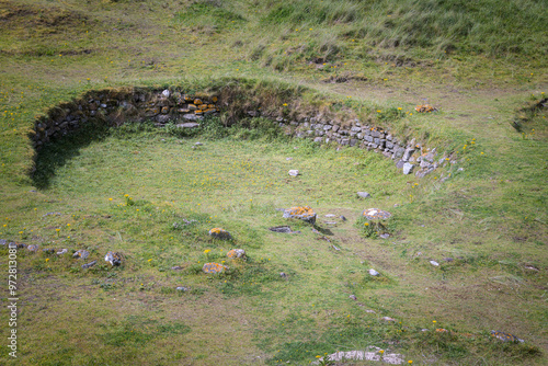 A summer HDR image of a late bronze age/early iron age Cladh Hallan roundhouse on South Uist, Outer Hebrides, Scotland
