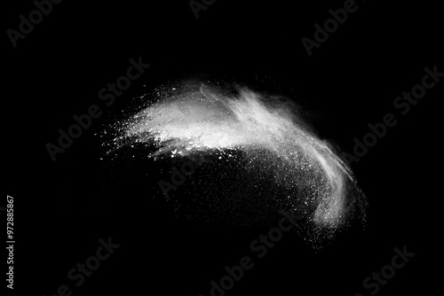 White powder explosion on black background.