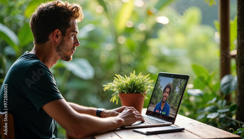 Digital nomad working remotely in Bali, with lush greenery and a relaxed, productive environment.






 photo