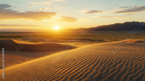 Expansive sand dunes of the Gobi desert, rippling patterns in the sand, under a golden sunset