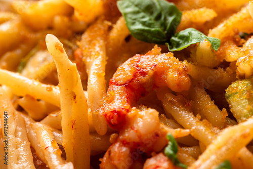 Piatto di deliziose trofie con sugo di gamberetti e bottarga di muggine, pasta italiana  photo