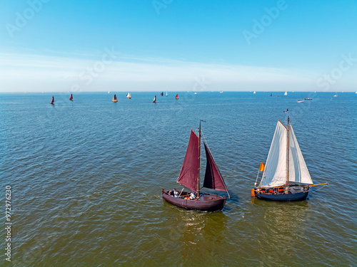 Aerial from ancient wooden ships on the IJsselmer in the Netherlands photo