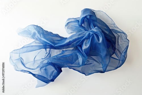 A cobalt blue plastic bag, its edges frayed and weathered