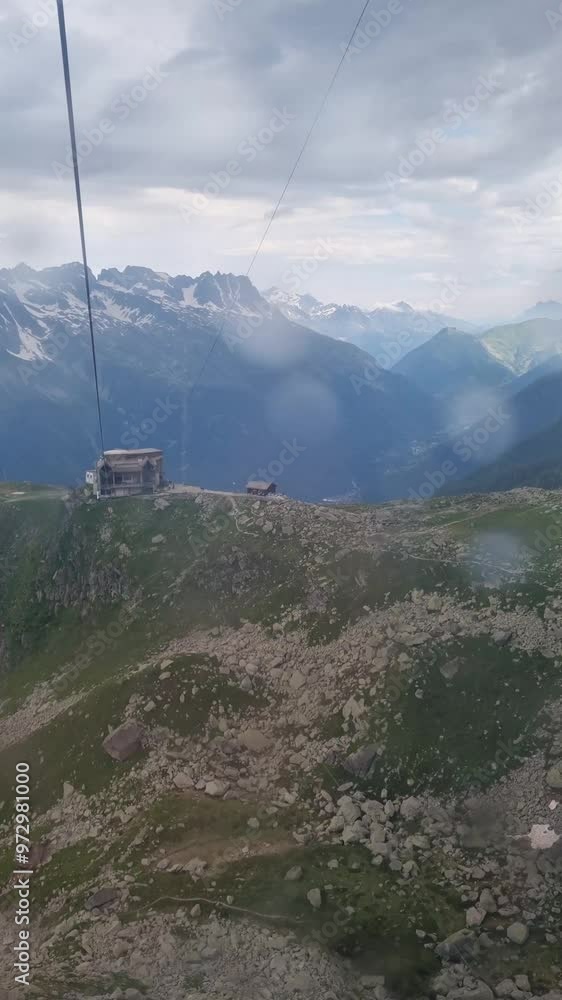 CHAMONI, FRANCE A view of the Aiguille du Midi telepherique cable car leading from Chamonix to Aiguille du Midi in the Mont Blanc Alps
CHAMONI, FRANCE A view of the Aiguille du Midi telepherique cable car leading from Chamonix to Aiguille du Midi in the Mont Blanc Alps