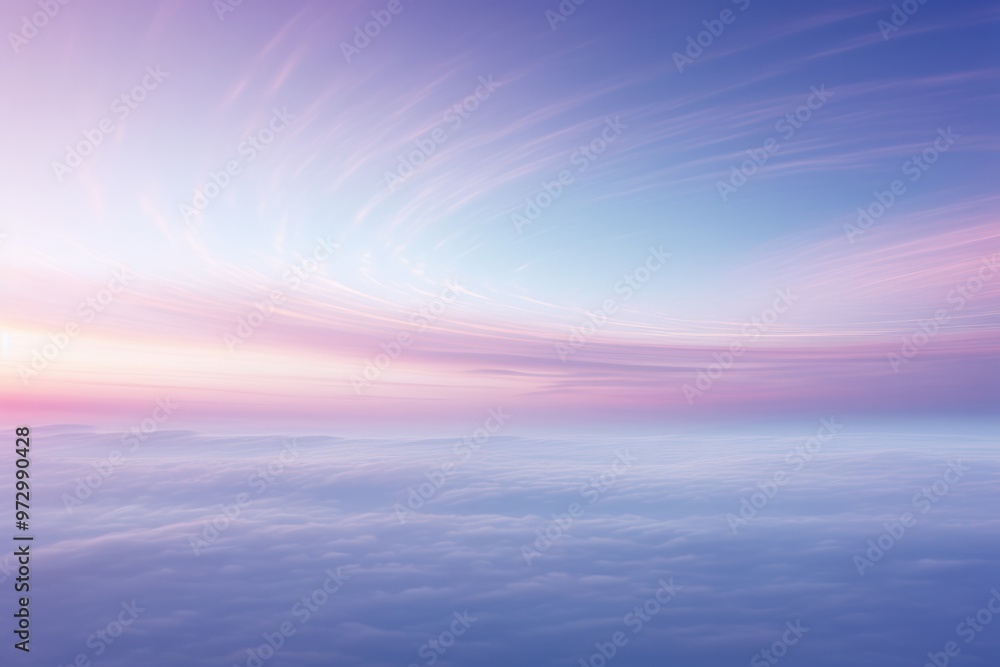 Naklejka premium A wispy cirrostratus cloud delicately tracing its path across the horizon, bathed in the soft hues of dawn.