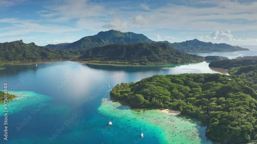 Summer travel exotic islands landscape. Serene sailboats yachts moored in turquoise lagoon. Stunning scene remote wild nature tropical luxury paradise. French Polynesia exploration. Drone aerial view Summer travel exotic islands landscape. Serene sailboats yachts moored in turquoise lagoon. Stunning scene remote wild nature tropical luxury paradise. French Polynesia exploration. Drone aerial view