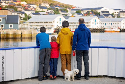 Family, traveling the North Cape with car, visiting small villages and enjoying the nature on the Nordkapp photo