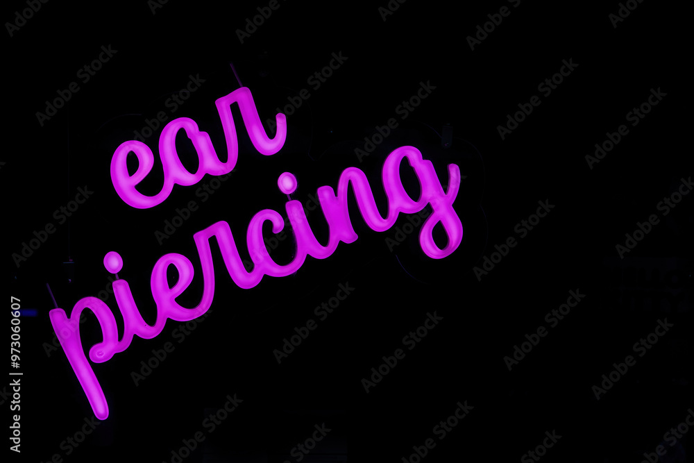 ear piercing led neon sign in a shop ear piercing led neon sign in a shop