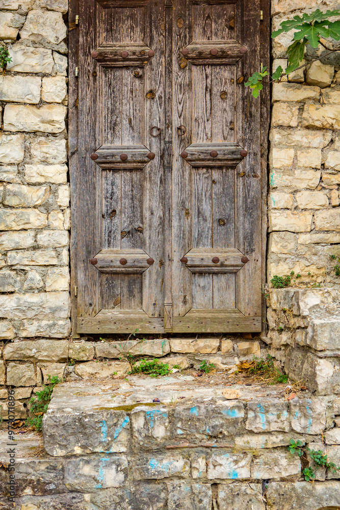 The famous old town of Berat in Albania. Picturesque street with houses from the Ottoman era. Beautiful landscape in central Albania. The famous old town of Berat in Albania. Picturesque street with houses from the Ottoman era. Beautiful landscape in central Albania.