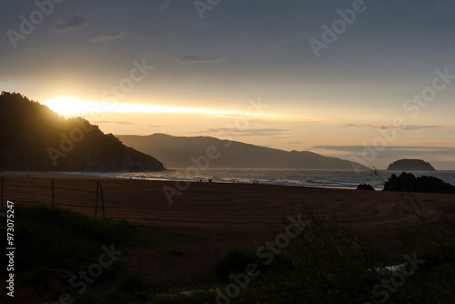 Wallpaper Mural Sunset Breaking Through Clouds at Laga Beach, Basque Country Torontodigital.ca