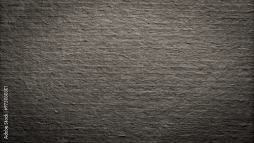 Black graphite texture of rough cardboard surface for backgrounds and designs