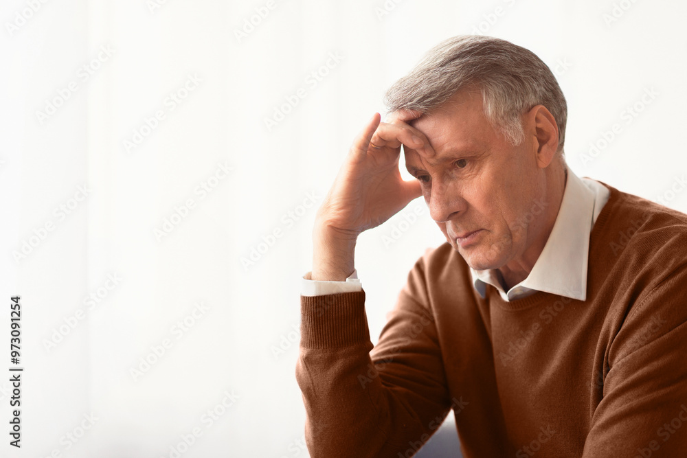 Stress. Depressed Senior Man Thinking About Problems Touching Head Sitting Against Window At Home. Selective Focus, Empty Space Stress. Depressed Senior Man Thinking About Problems Touching Head Sitting Against Window At Home. Selective Focus, Empty Space