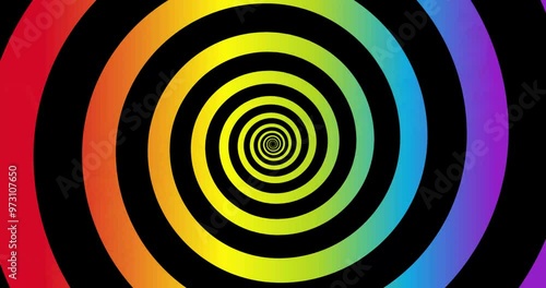 Moving hypnotic spiral. Seamless Psychedelic spiral and slow rotation. Muliticolor and black background. photo