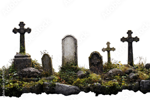 Ancient gravestones covered in moss and surrounded by rocks and grass, showcasing a historical cemetery scene with weathered memorials.