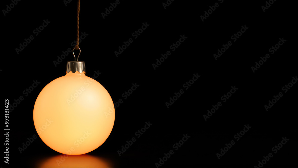 Glowing Christmas ornament in darkness Glowing Christmas ornament in darkness