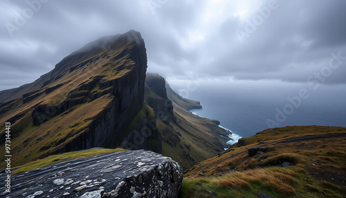 A landscape view of the Gjogv Cliff in the Faroe island during a stormy morning.