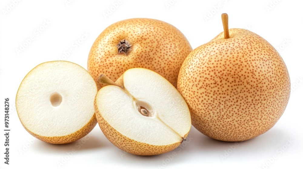 A group of pears, including one sliced in half, showcasing their texture and color. A group of pears, including one sliced in half, showcasing their texture and color.