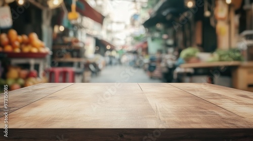 A blurred market scene with a wooden table in the foreground, suggesting a food-related setting.