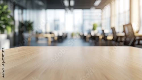 Modern office interior with a wooden table in focus, showcasing a professional environment.