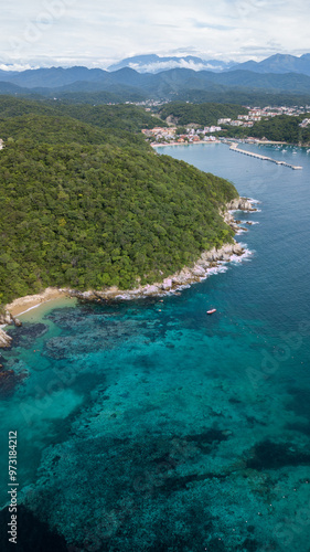 Aerial view of Santa Cruz Huatulco Bay on a sunny day in Oaxaca, Mexico