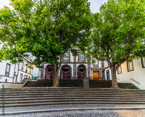 A view up steps towards a church in Ponta Delgada on the island of San Miguel in the Azores in summertime