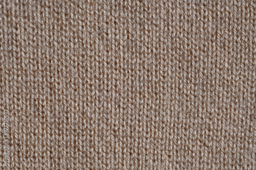 texture of knitted light brown sweater, close-up texture of beige knitted fabric, macro texture of tan knitted woolen clothes texture of knitted light brown sweater, close-up texture of beige knitted fabric, macro texture of tan knitted woolen clothes