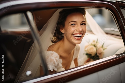A happy bride with dark hair in a white dress looking out of a vintage car window