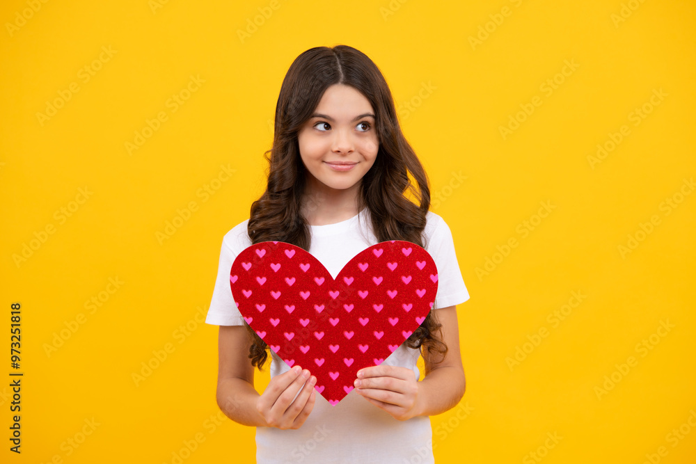 Valentines Day. Dreaming cute teen child with red heart. Happy teenager, positive and smiling emotions of teen girl. Valentines Day. Dreaming cute teen child with red heart. Happy teenager, positive and smiling emotions of teen girl.