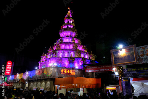 13 September 2024, Pune, Maharashtra, India, A huge crowd gathers to witness the grand Himachal Jatoli Shiva Temple replica created by the Dagdusheth Halwai Ganapati Trust Mandal for Ganeshotsav 2024.