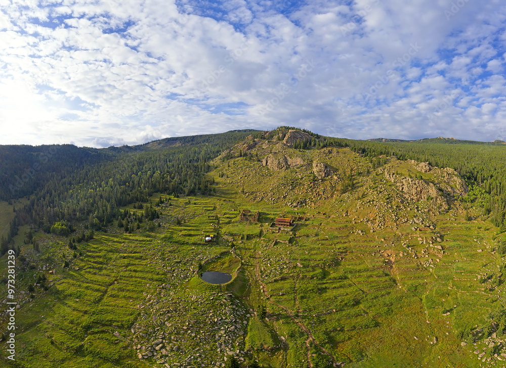 The grounds of the Manzushir Monastery located in the south of protected Bogd Khan Mountain, 45 km by road from Ulaanbaatar, and 8 km northeast of Zuunmod town, Mongolia
