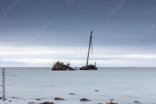 SS or MV Kaffir Clyde puffer wreck rusting north of Ayr Harbour with seaweed foreground - Long exposure photo