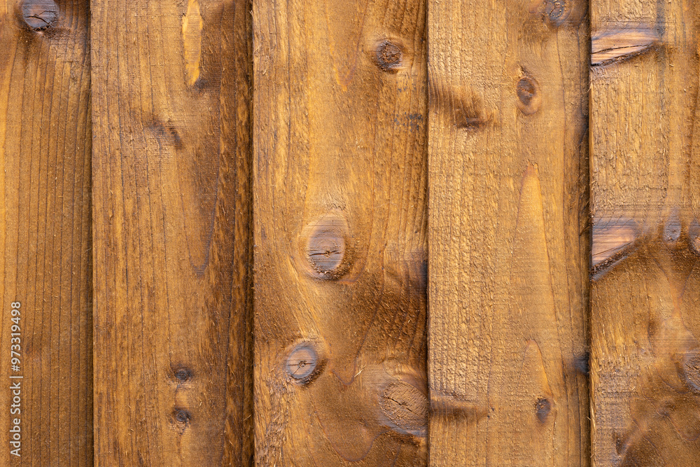 Rough sawn brown wood fence boards wooden texture background Rough sawn brown wood fence boards wooden texture background