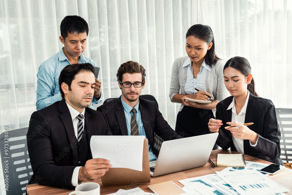 Diverse of business people from various ethnic group working in modern office environment. Productive and multi ethnic office workers engage in discussion for strategic business marketing. Meticulous Diverse of business people from various ethnic group working in modern office environment. Productive and multi ethnic office workers engage in discussion for strategic business marketing. Meticulous