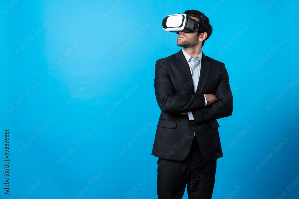 Smart business man crossing arms and standing with folded arm at white background. Professional manager looking at financial graph by using technology innovation to visit enter metaverse. Deviation. Smart business man crossing arms and standing with folded arm at white background. Professional manager looking at financial graph by using technology innovation to visit enter metaverse. Deviation.