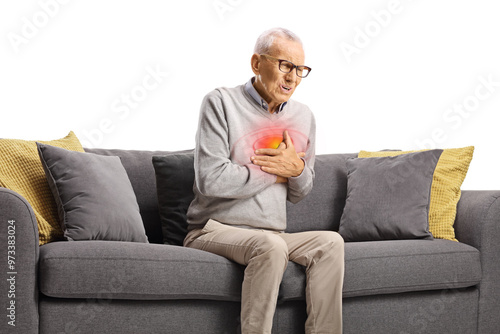 Quadro su tela Elderly man with cardiac arrest sitting on a sofa
