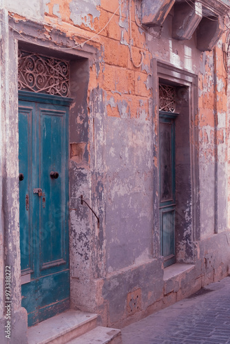 Old ruined facade buildings in the beautiful old town of touristic Gozo, Malta Island